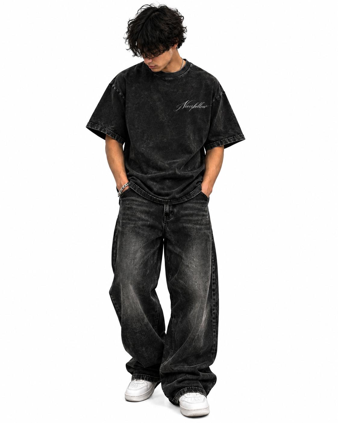 Hush Tee Obsidian, worn, front view, with the Neverhollow script on the chest
